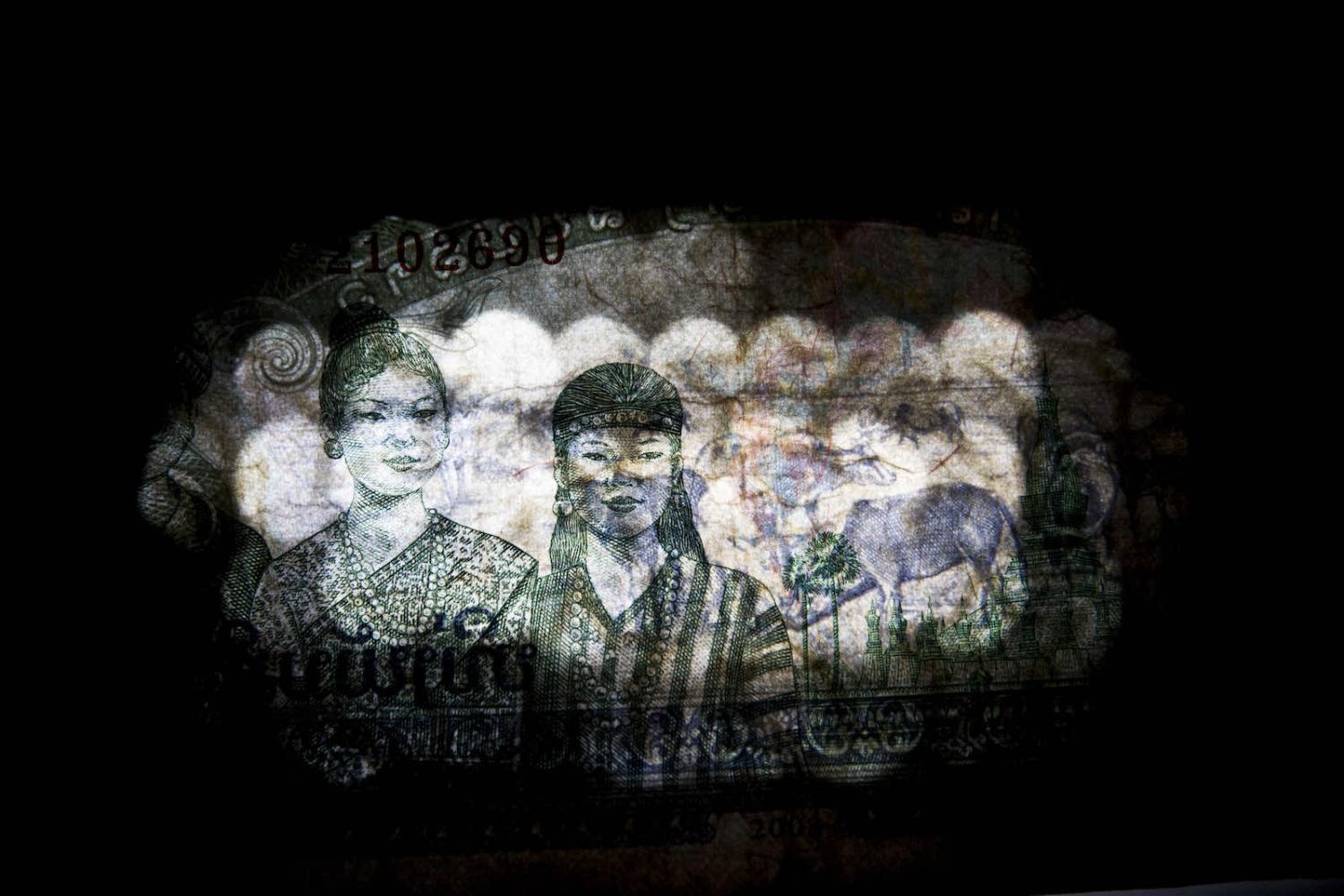 A Lao 1000 kip banknote (Brent Lewin/Bloomberg via Getty Images)