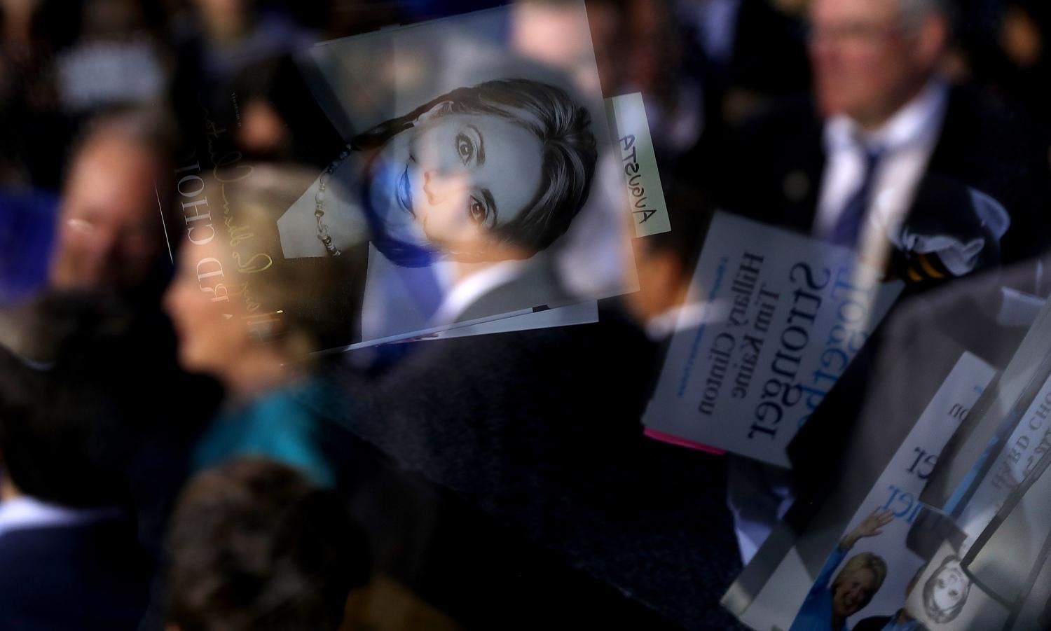 Books reflected in a teleprompter during a Hillary Clinton campaign rally in the 2016 election (Photo: Justin Sullivan/Getty)