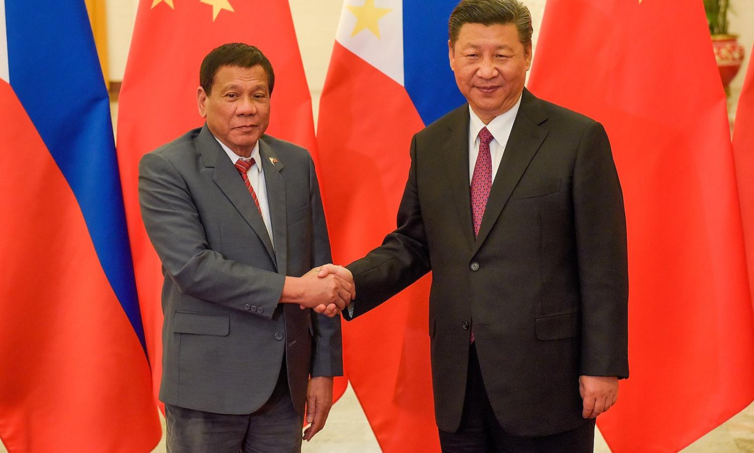 Philippines President Rodrigo Duterte in Beijing meeting China’s Xi Jinping in 2017 (Photo: Etienne Oliveau/Getty)