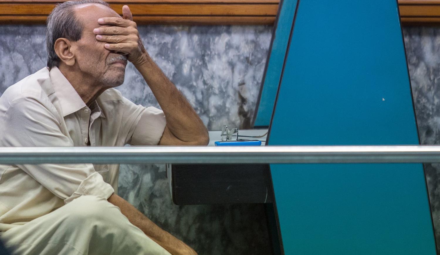 A man reacts during a trading session at the Pakistan stock exchange in Karachi, Pakistan on 9 July (Photo: Asim Hafeez via Getty)