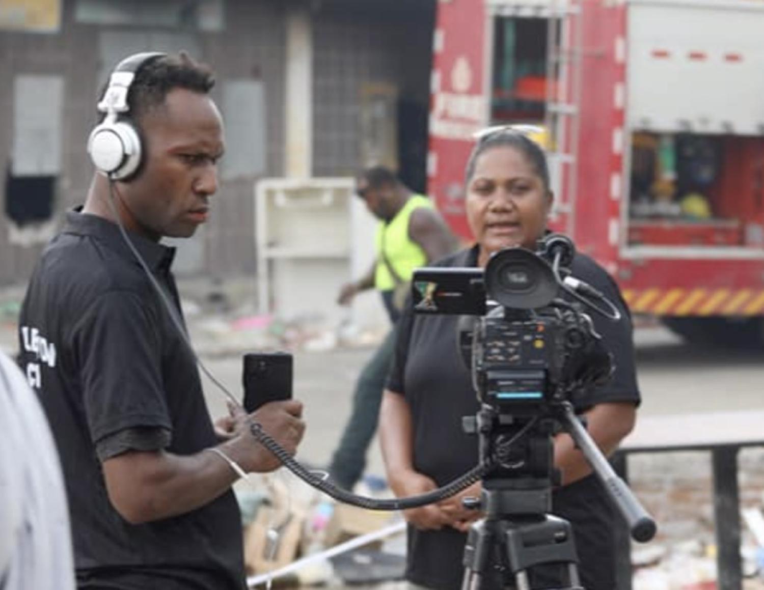 Freelance journalist Gina Kekea and Media One videographer/cameraman Geoff Saemanea (Elizabeth Osifela)