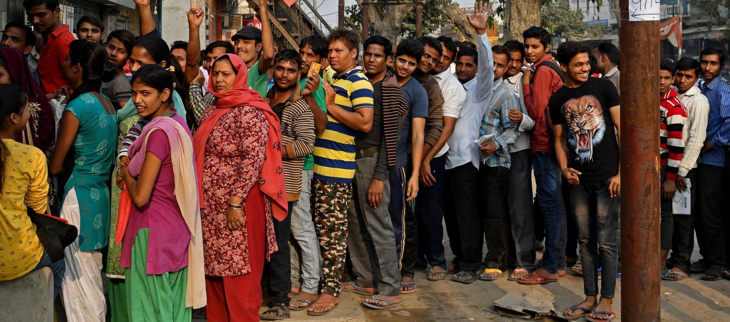 Long queues as customers wait to exchange banknotes
