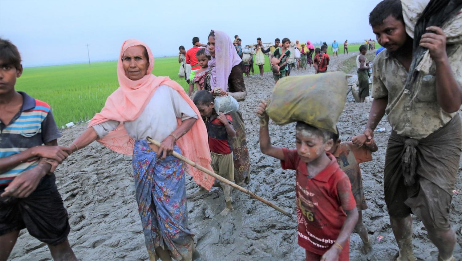 Rohingya refugees from Rakhine state in Myanmar near Teknaf in Bangladesh on Sunday. (Photo: Zakir Hossain Chowdhury/Getty Images)