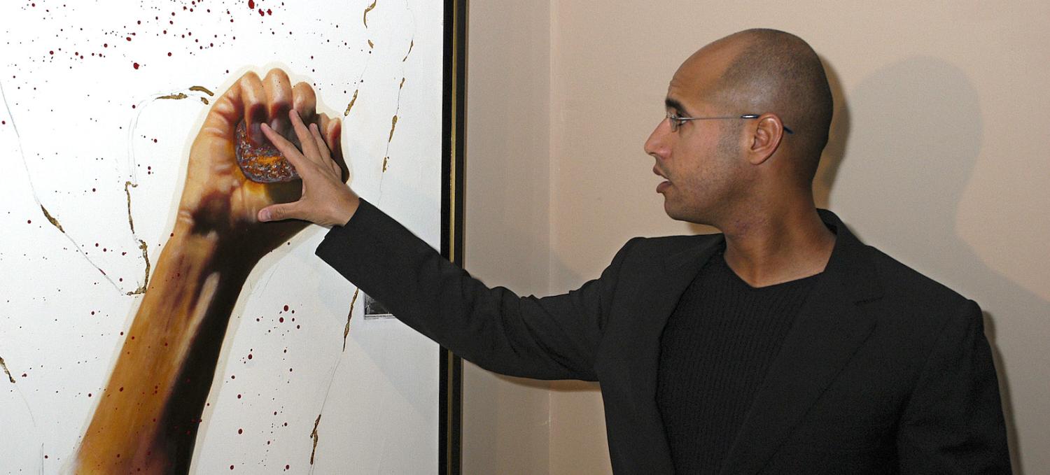 Saif Gaddafi at an art exhibition in Spain, 2004 (Photo: Fernando Camino/Getty)