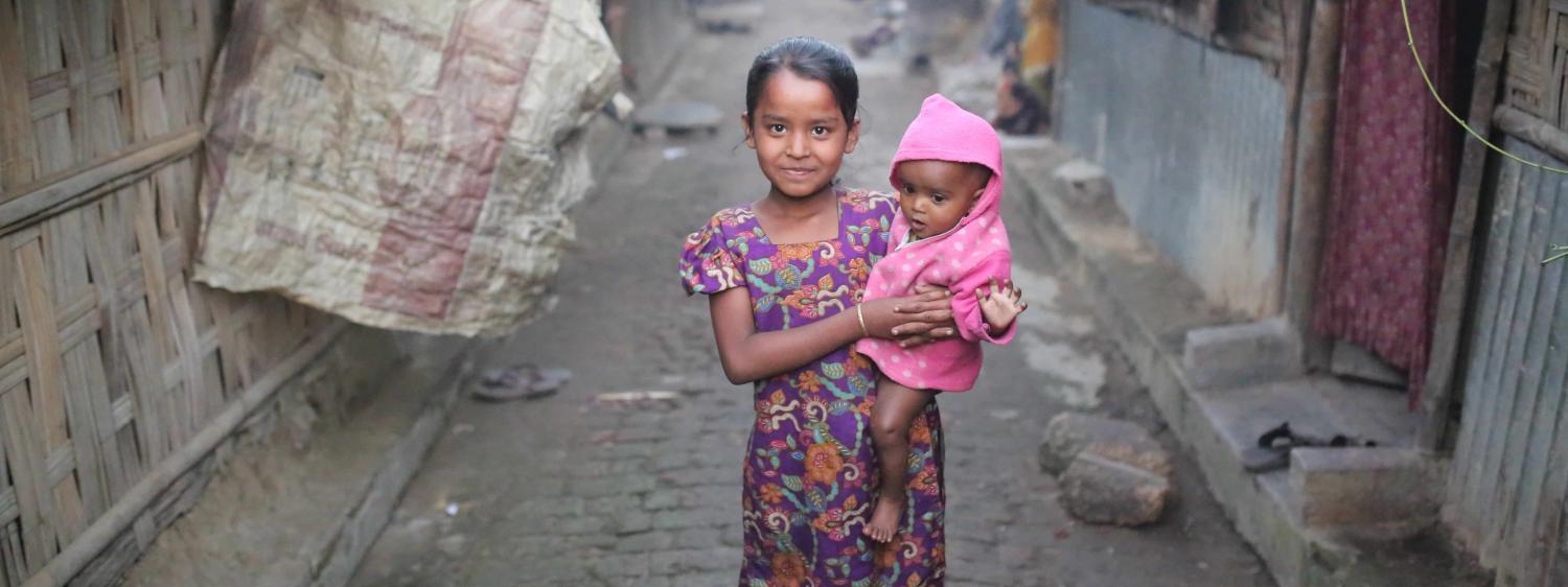Two children in a unregistered Rohingya camp in Bangladesh, December 2016. Photo: Getty Images/Anadolu Agency
