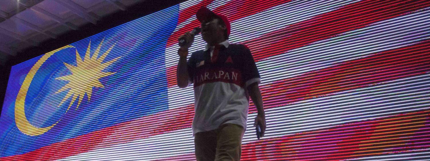 A supporter speaking on stage at a rally to celebrate Pakatan Harapan’s election win. (Photo:Faris Hadziq/Getty)