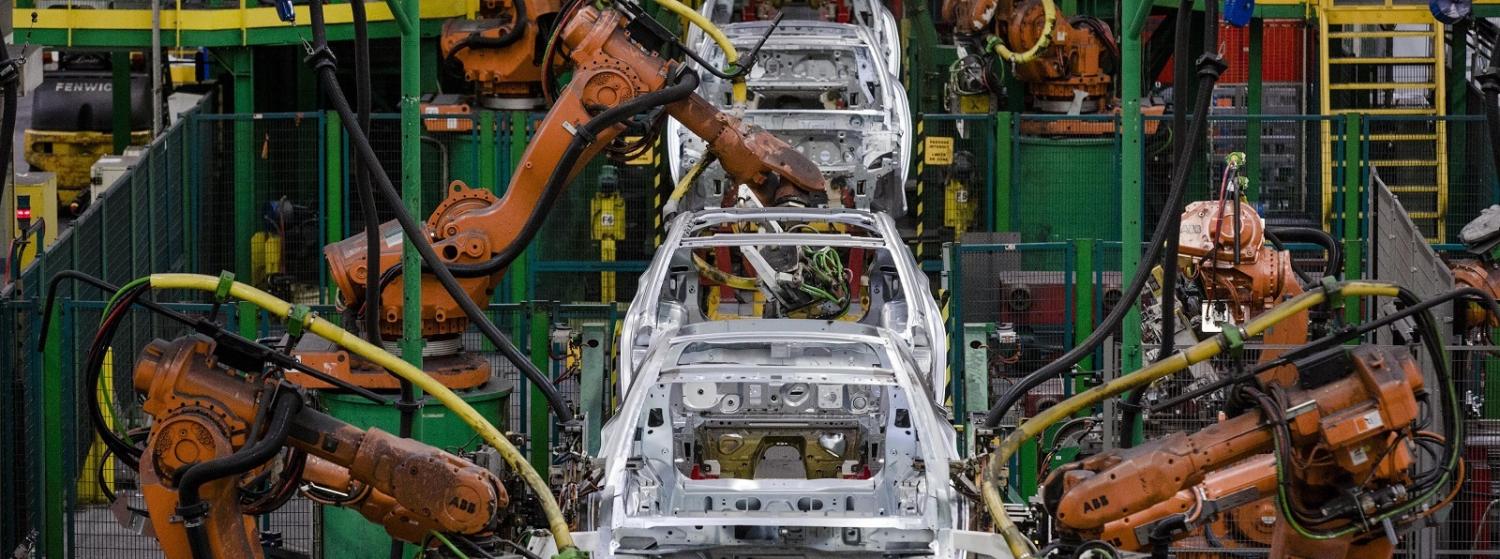 Robotic arms on the assembly line at the Renault SA factory in Flins, France. (Photo: Marlene Awaad/via Getty Images)