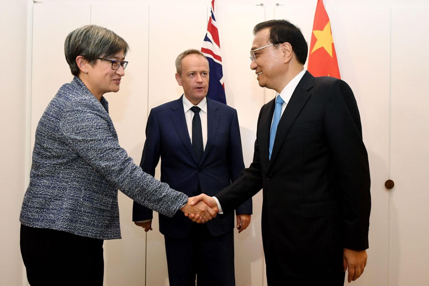 Penny Wong and Bill Shorten meet Chinese Premier Li Keqiang in March 2017. (Photo: Lucas Coch/Getty)