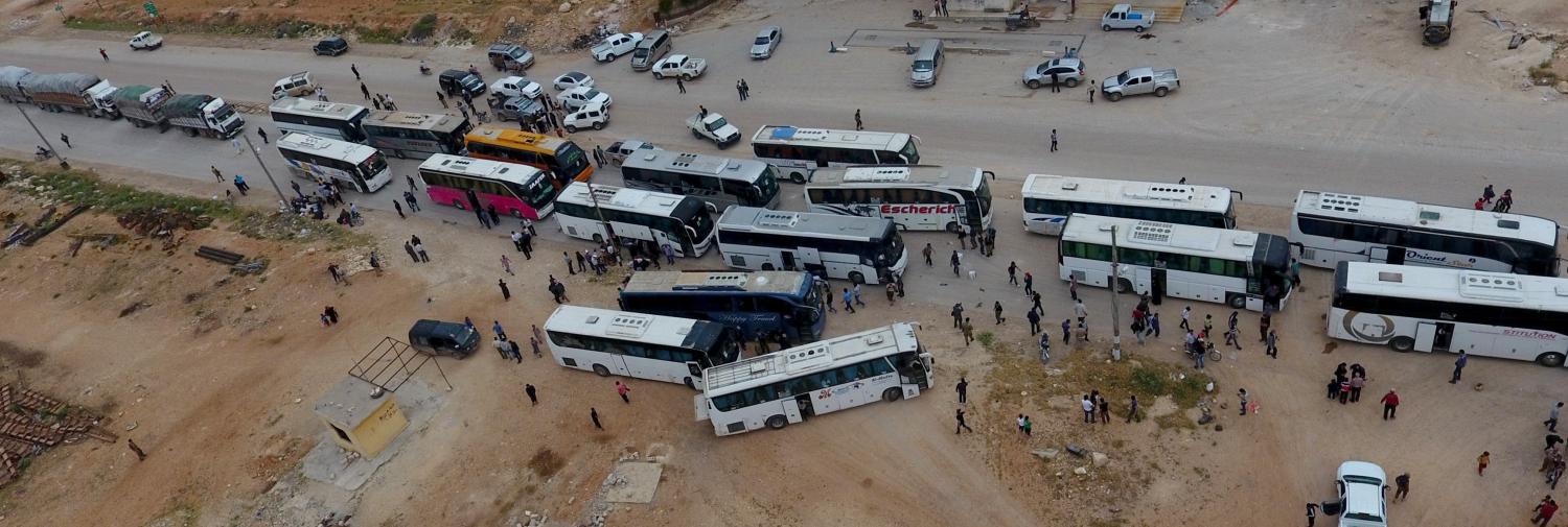 The evacuation of a district in Homs, Syria, 2017 (Photo: Getty Images/Anadolu Agency)